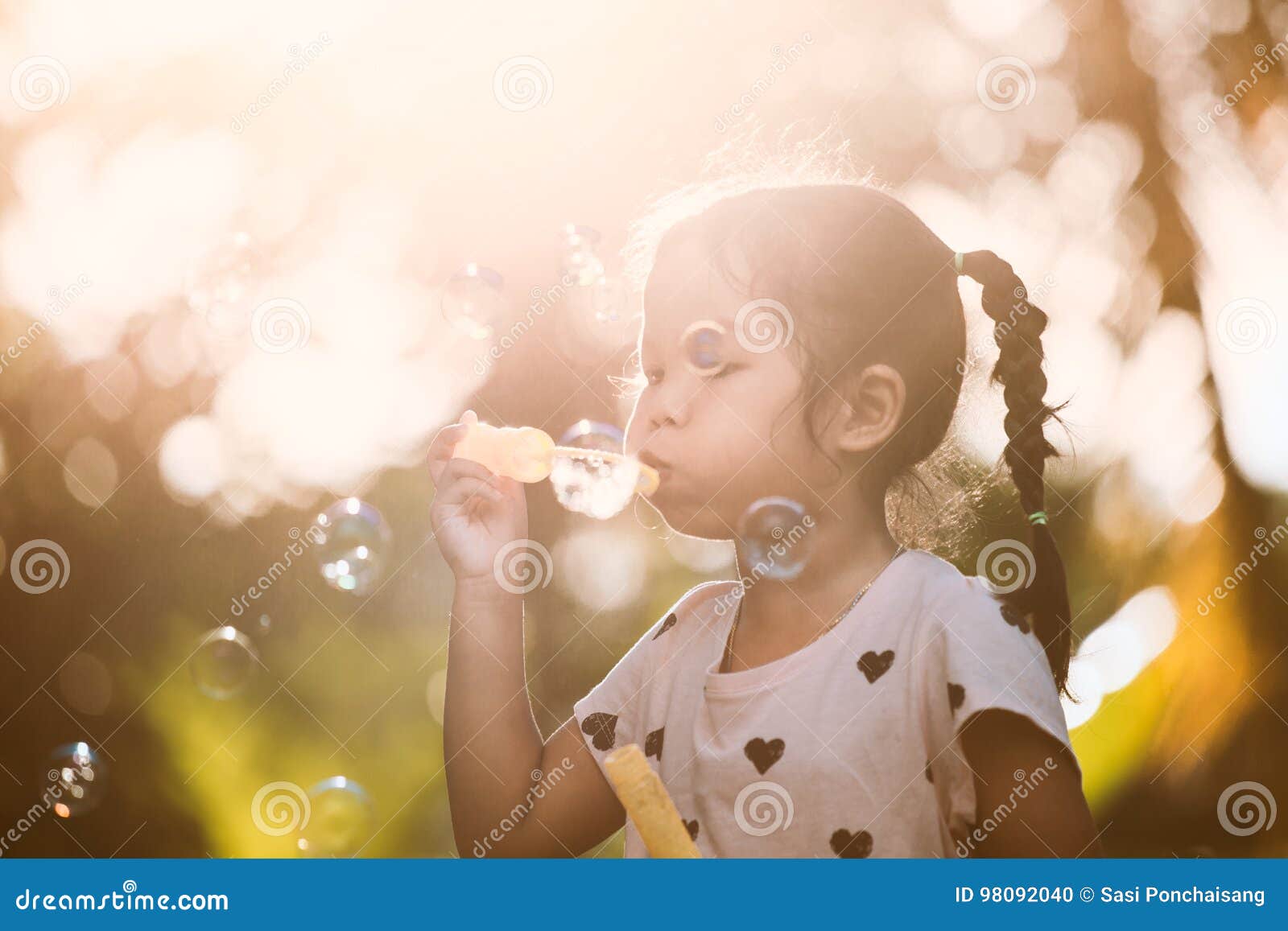 asian watching Bubble outdoor