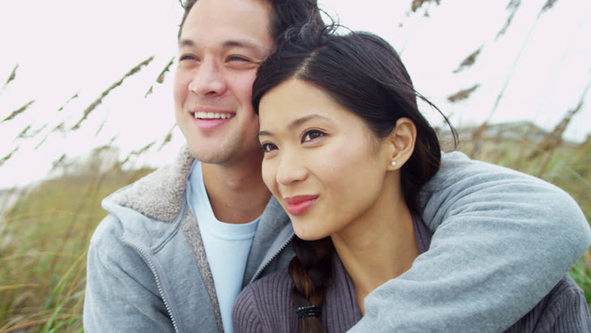 Otngagged young asian couple